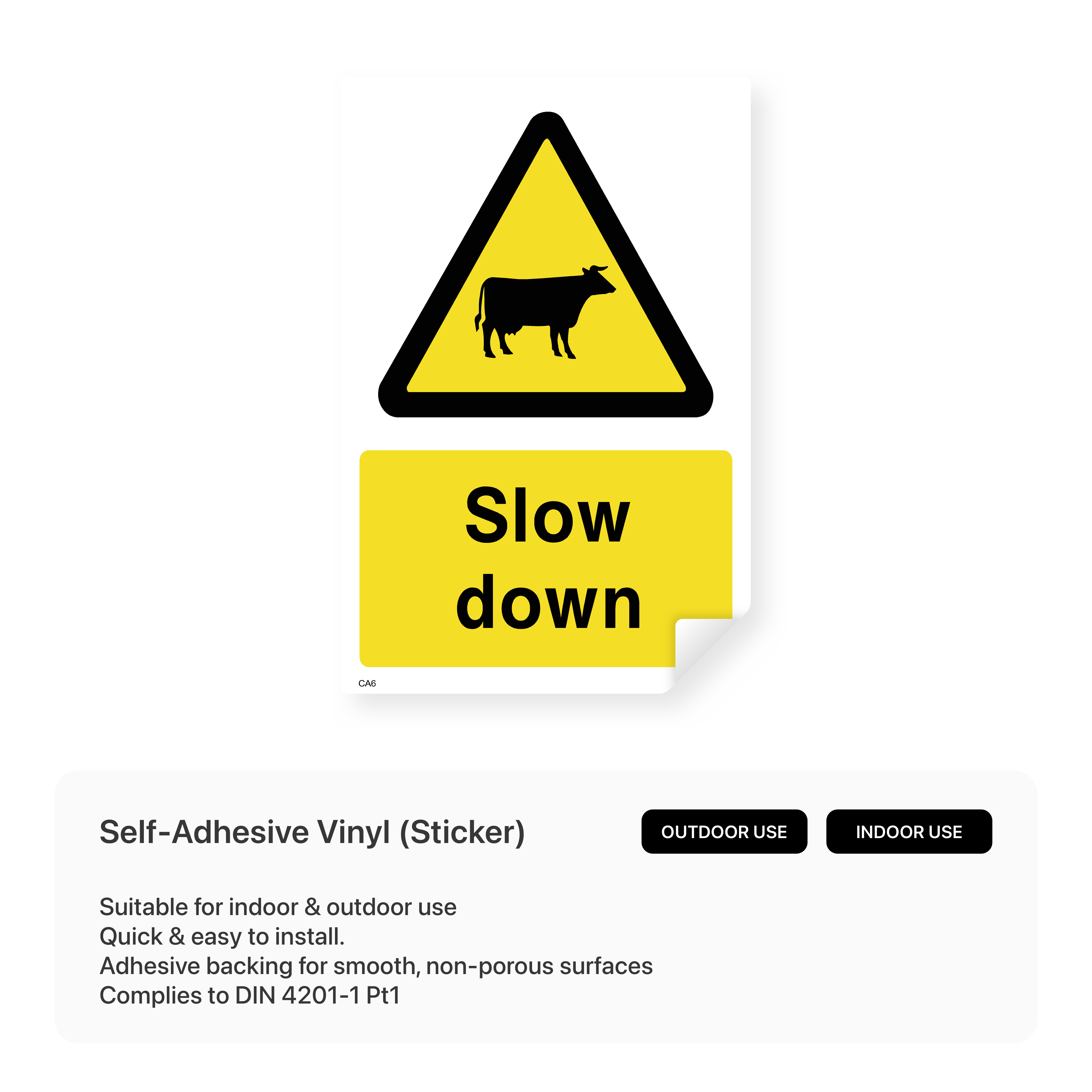 Sign with cattle and "slow down" text