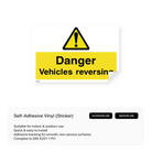 Construction site warning sign: "Danger vehicles reversing"