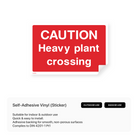 Construction site warning sign: "Caution - Heavy plant crossing"