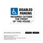 A sign indicating disabled parking is required outside the front of a house.