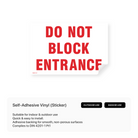 Sign prohibiting blocking of entrance.