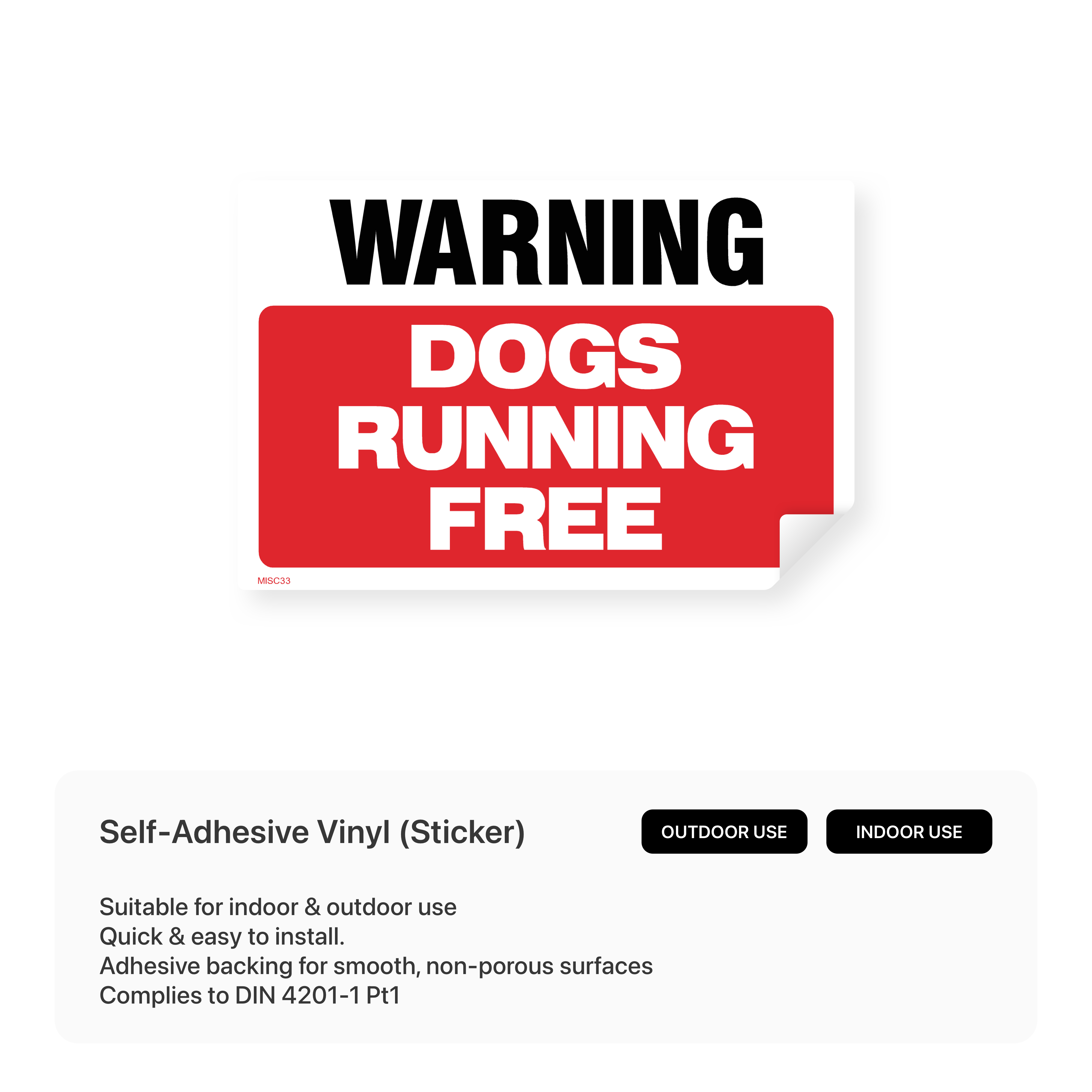 "Warning - Dogs Running Free" sign on a fence post.